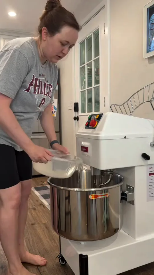 Goldenrod's baker working with a dough mixer in the bakery kitchen